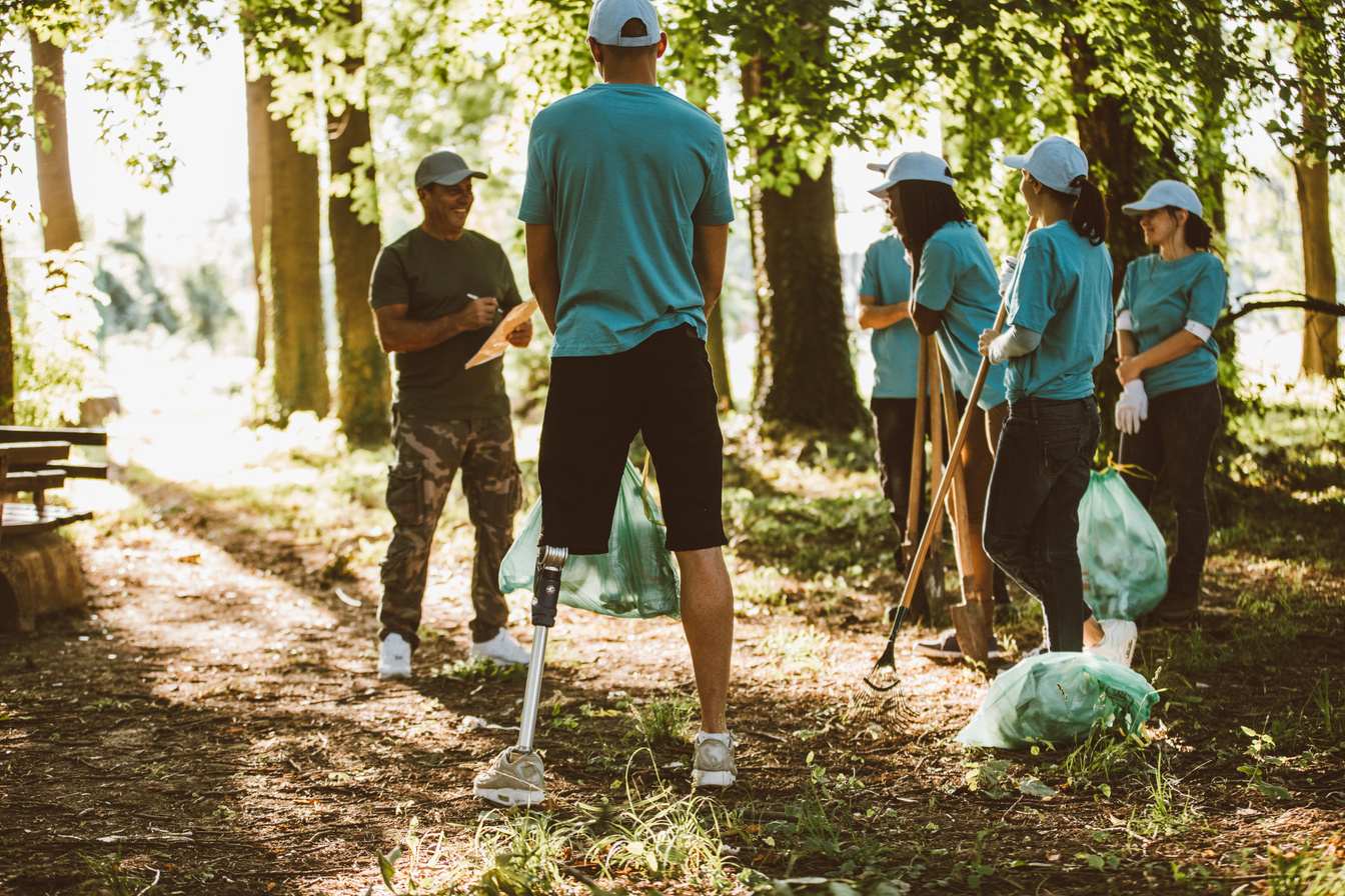 People cleaning nature together